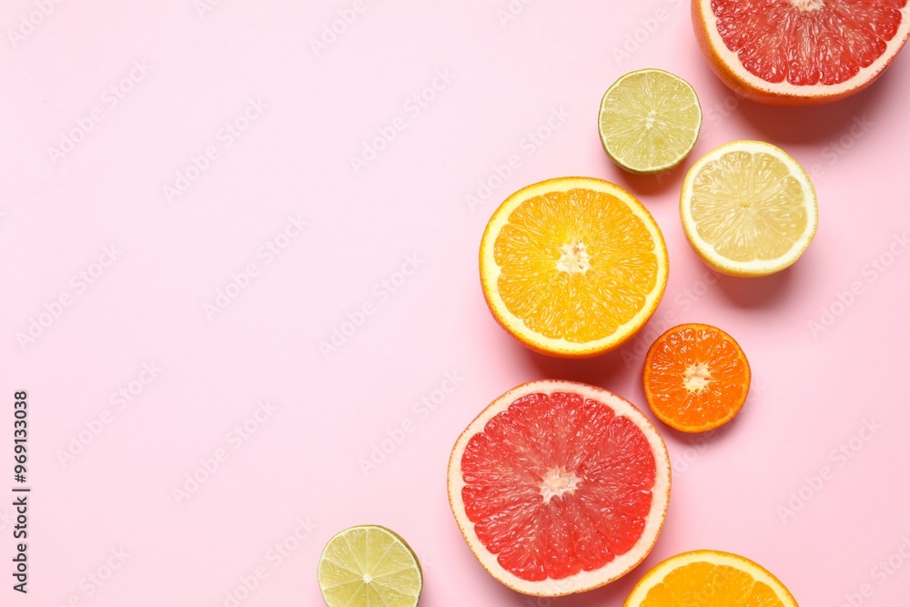Tropical fruits on a colored background. Summer concept. Flat lay, top view, copy space Tropical fruits on a colored background. Summer concept. Flat lay, top view, copy space