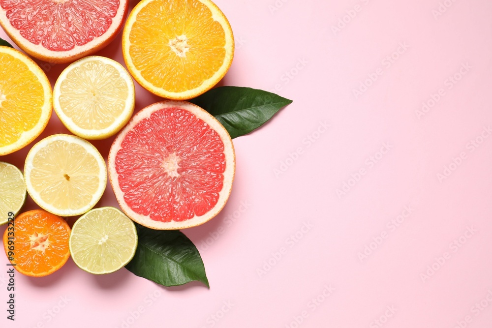 Tropical fruits on a colored background. Summer concept. Flat lay, top view, copy space Tropical fruits on a colored background. Summer concept. Flat lay, top view, copy space