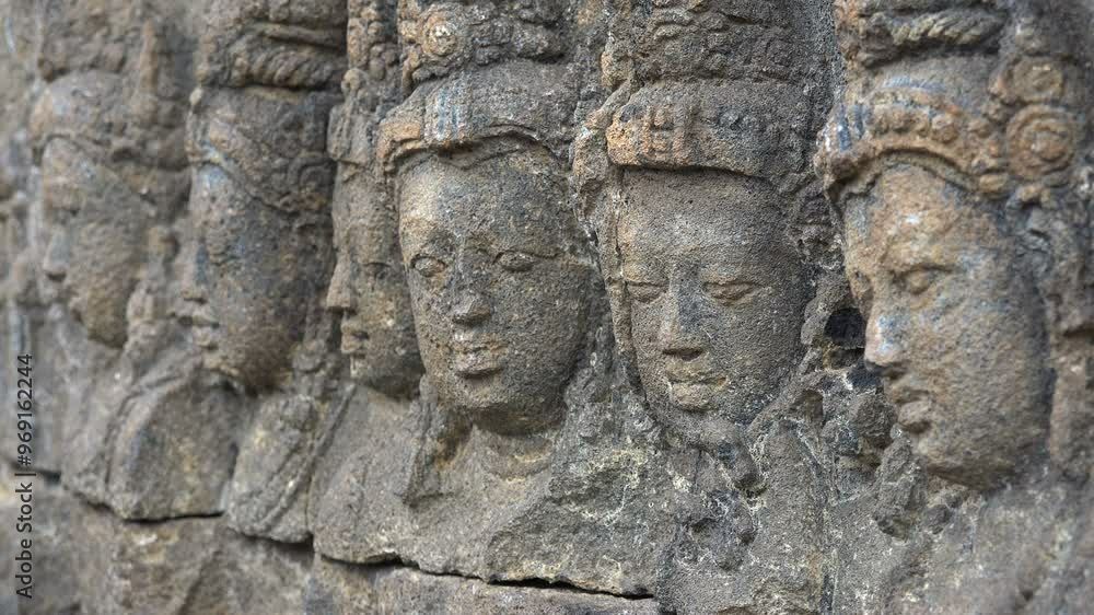 Close-up view of ancient sculptures of Borobudur Buddhist temple complex in Indonesia
Close-up view of ancient sculptures of Borobudur Buddhist temple complex in Indonesia