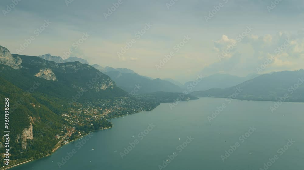 Aerial shot of the town of Veyrier-du-Lac and Lake Annecy, one of the cleanest lakes in Europe. France Aerial shot of the town of Veyrier-du-Lac and Lake Annecy, one of the cleanest lakes in Europe. France