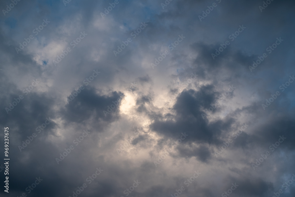 Dramatic dark clouds in sky. Evening shot of bright stormy clouds, beautiful cloudscape Dramatic dark clouds in sky. Evening shot of bright stormy clouds, beautiful cloudscape