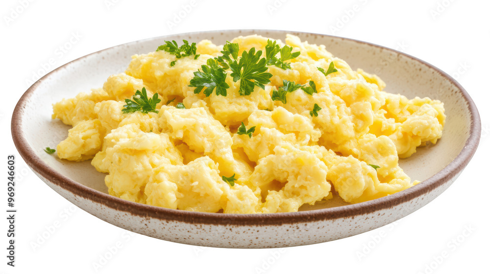 Creamy scrambled eggs garnished with fresh parsley, served on rustic plate. This dish is perfect for breakfast or brunch, offering delicious and comforting meal. Creamy scrambled eggs garnished with fresh parsley, served on rustic plate. This dish is perfect for breakfast or brunch, offering delicious and comforting meal.