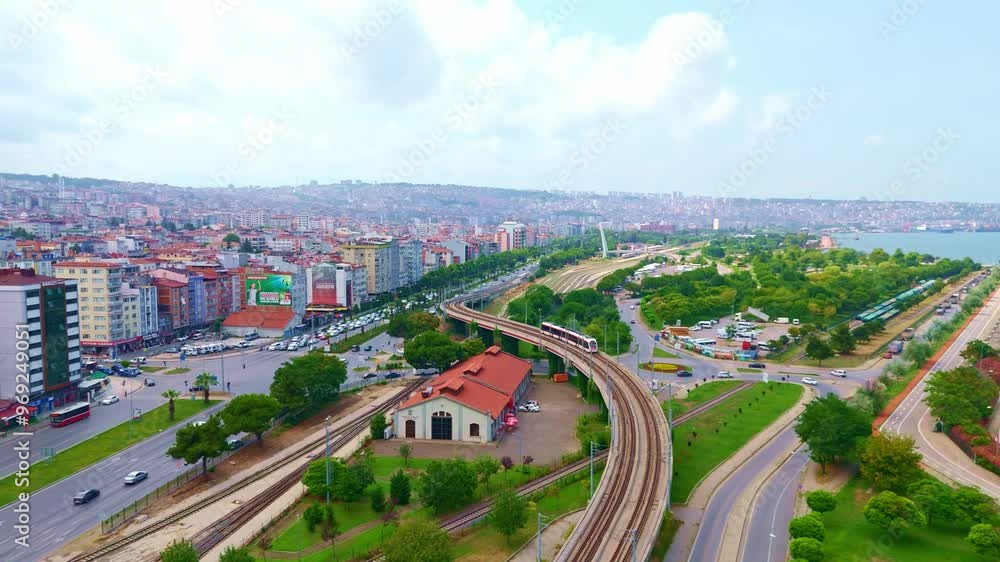Aerial view a city with a train. Aerial view a city with a train.