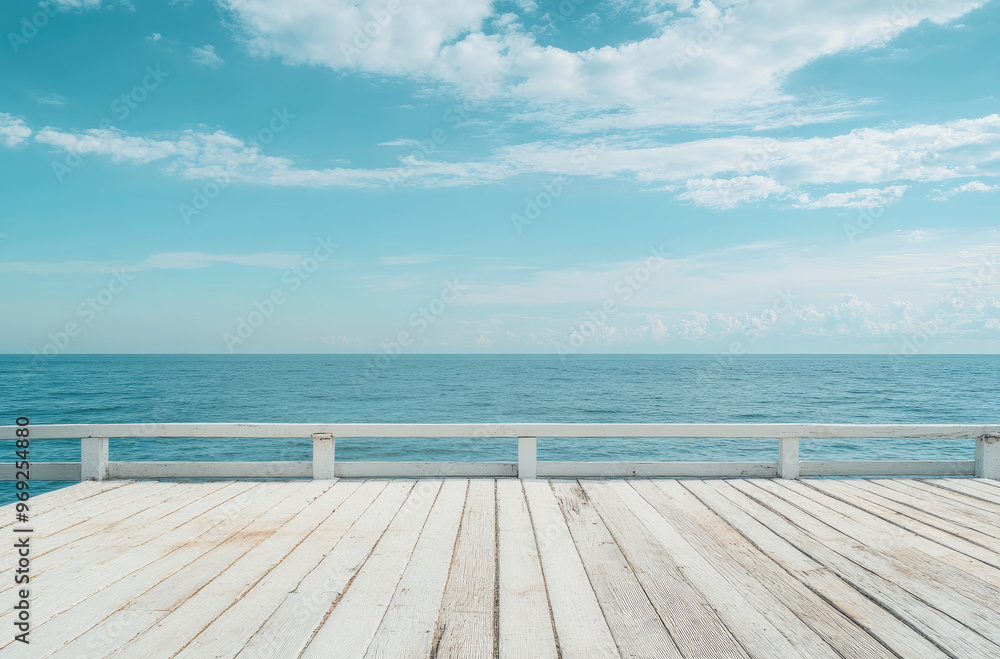 Obraz premium Peaceful Seaside Pier with an Empty Deck for Displaying Calm Ocean Views