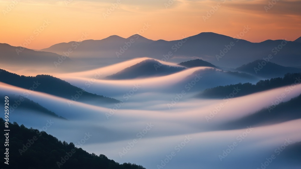 Serene landscape of rolling hills shrouded in mist during sunset. Serene landscape of rolling hills shrouded in mist during sunset.