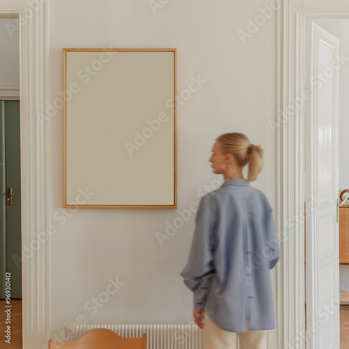 wooden frames mockup with woman in the wabi-sabi style minimalist interior design, soft color palette 