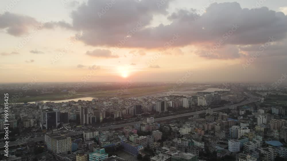 Drone view of beautiful sunset with the cityscape of Dhaka city in Bangladesh Drone view of beautiful sunset with the cityscape of Dhaka city in Bangladesh