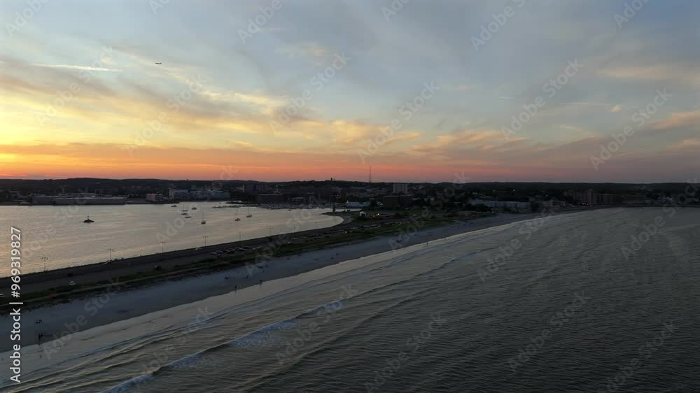 Aerial serene view of sea at Nahant Beach, Massachusetts with beautiful sunset in the background Aerial serene view of sea at Nahant Beach, Massachusetts with beautiful sunset in the background