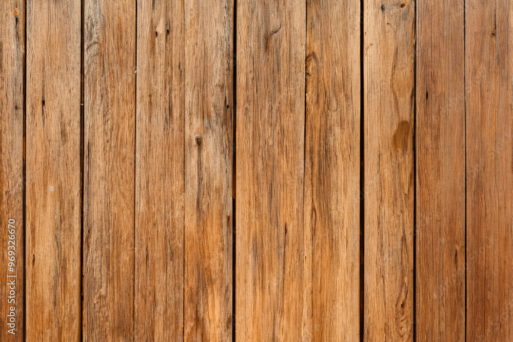 Close-up shot of a rustic wooden texture with natural wood grain and knots. Close-up shot of a rustic wooden texture with natural wood grain and knots.