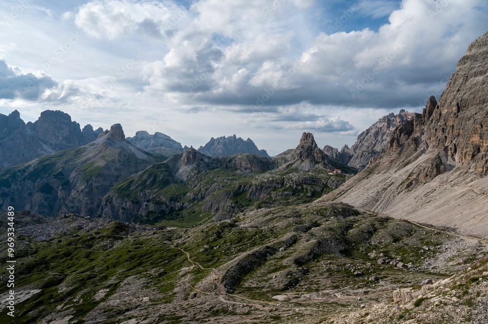 Fototapeta premium Stunning Dolomites mountain landscape with dramatic clouds.