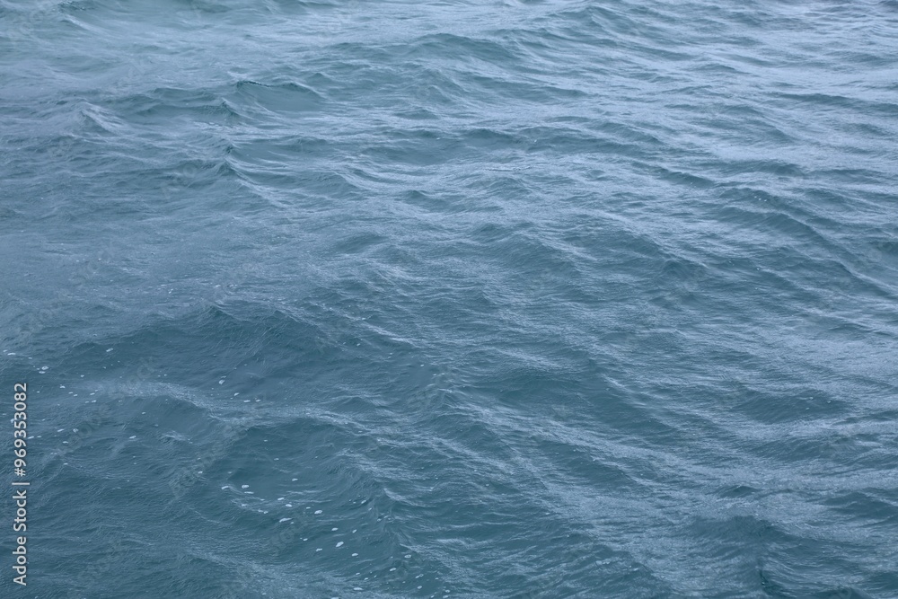 Ripples of sea surface - abstract background Ripples of sea surface - abstract background