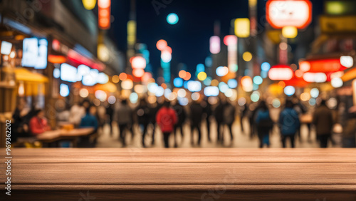 Wallpaper Mural Empty wooden table top with blurred background of a Japanese winter market people walking around and eating at food stalls under lights at night Torontodigital.ca