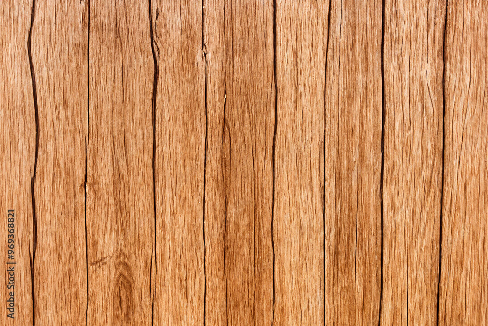 Close-up of natural wooden planks with cracks and grain texture. Close-up of natural wooden planks with cracks and grain texture.