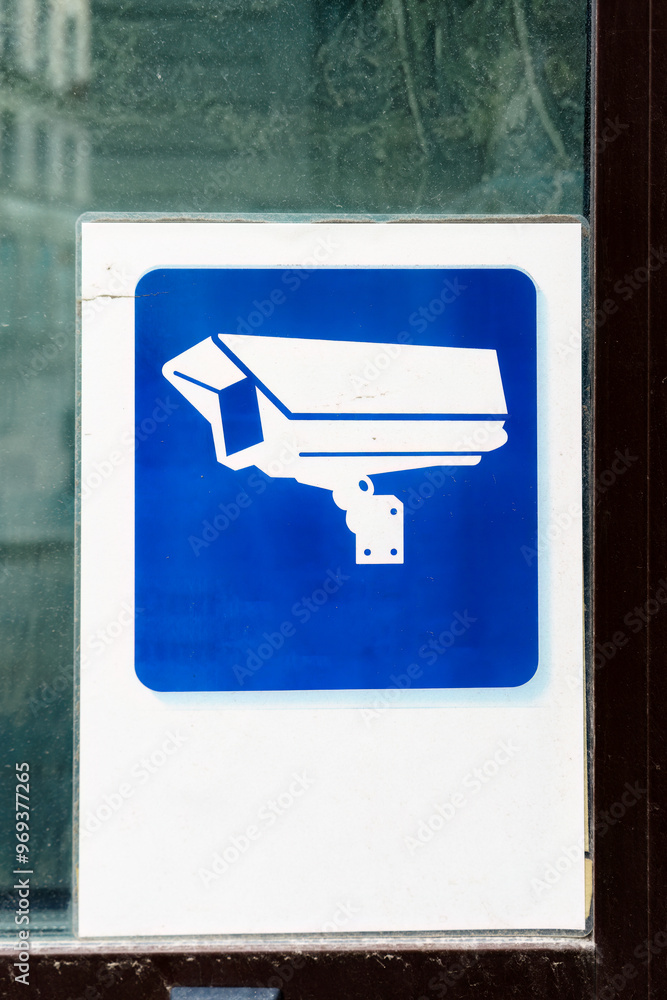 Security camera sign mockup on glass Security camera sign mockup on glass