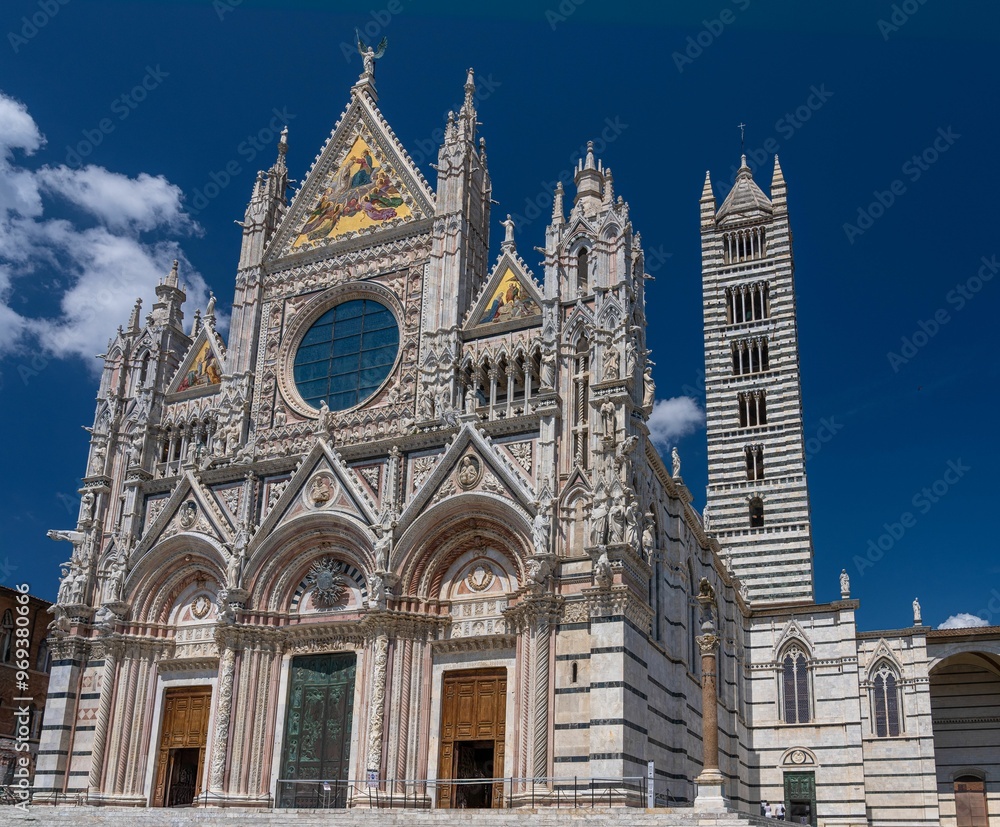 Stunning facade of Siena Cathedral under a clear blue sky Stunning facade of Siena Cathedral under a clear blue sky
