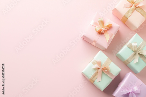 Wallpaper Mural A set of bright colorful gift boxes with a luxurious gold satin ribbon perfect for a soft celebratory theme  for  christmas, birthday, Torontodigital.ca