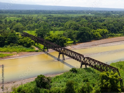 View of Trainway bridge in Rio Frio Sarapiqui, Costa Rica photo