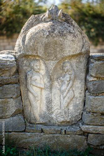 Obraz na płótnie The figure of the ancient gods on the stones in the autumn park. Ukraine. Scythian culture w salonie