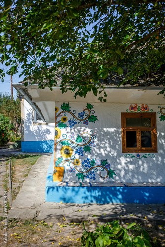 Obraz na płótnie Ukrainian house painted with floral patterns in ancient technique w salonie