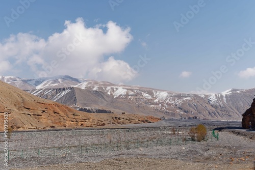 Scenic view of an arid landscape with mountains near the Nepal-Tibet, China border.