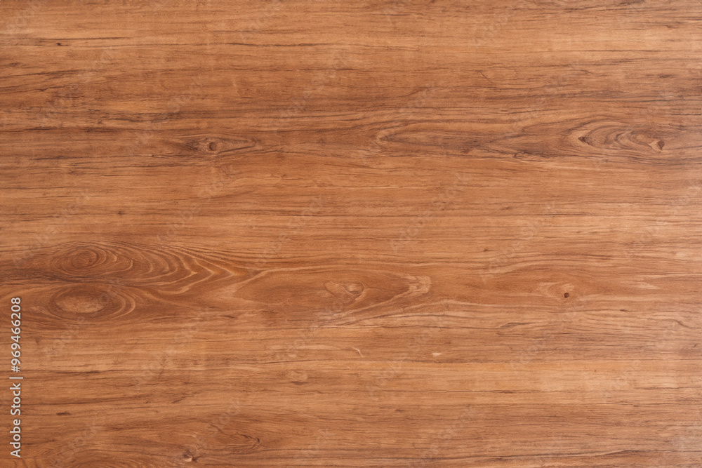 Close-up of a light brown wood grain texture with knots and lines. Close-up of a light brown wood grain texture with knots and lines.