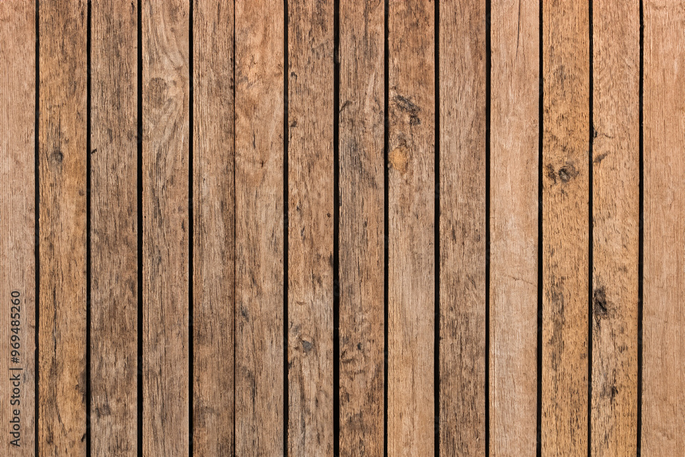 Close-up of rustic wooden planks with natural grain pattern. Close-up of rustic wooden planks with natural grain pattern.