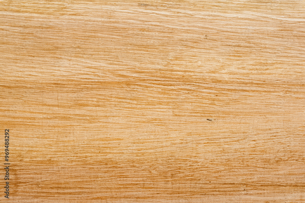 Closeup of light brown wood grain with a warm, natural texture. Closeup of light brown wood grain with a warm, natural texture.