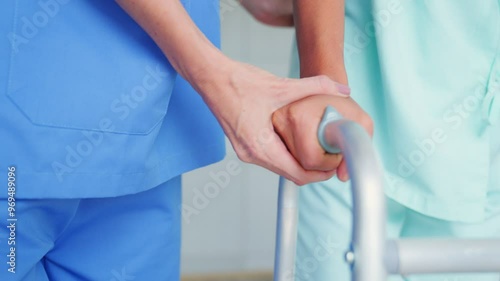 A physiotherapist who performs rehabilitation, Hands, stretching leg or physiotherapy for a patient to help in physical therapy rehabilitation closeup. Chiropractor healing or massage in recovery.