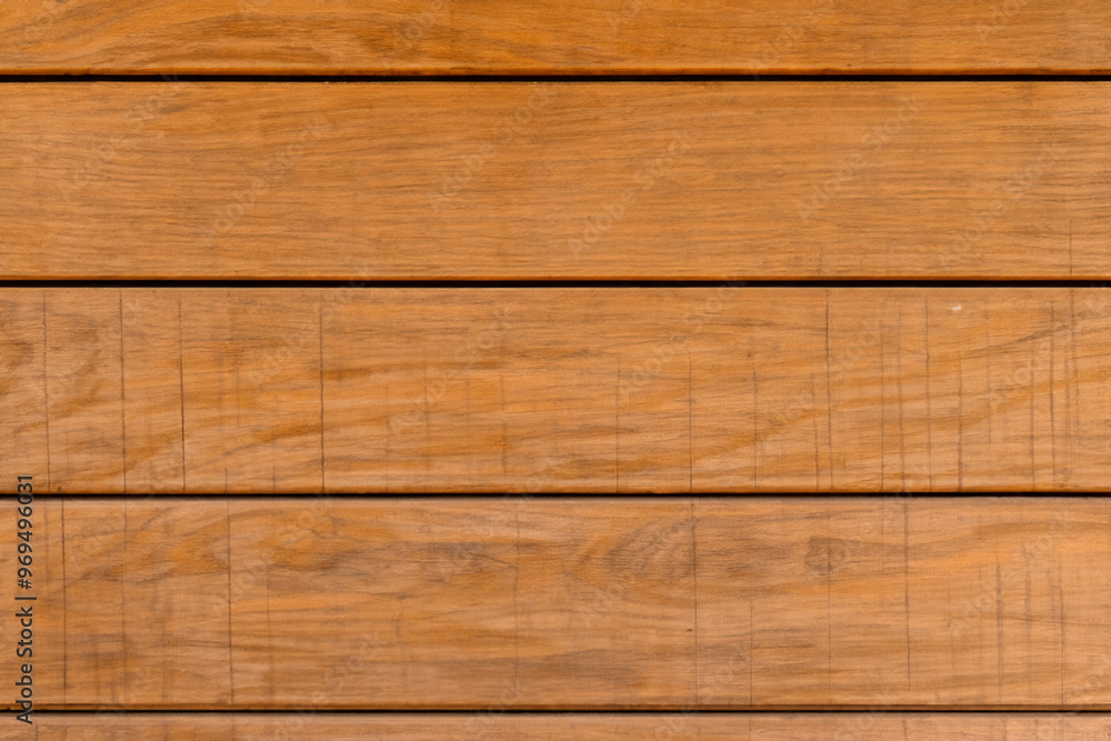 Close-up of a horizontal wooden surface with grain. Close-up of a horizontal wooden surface with grain.