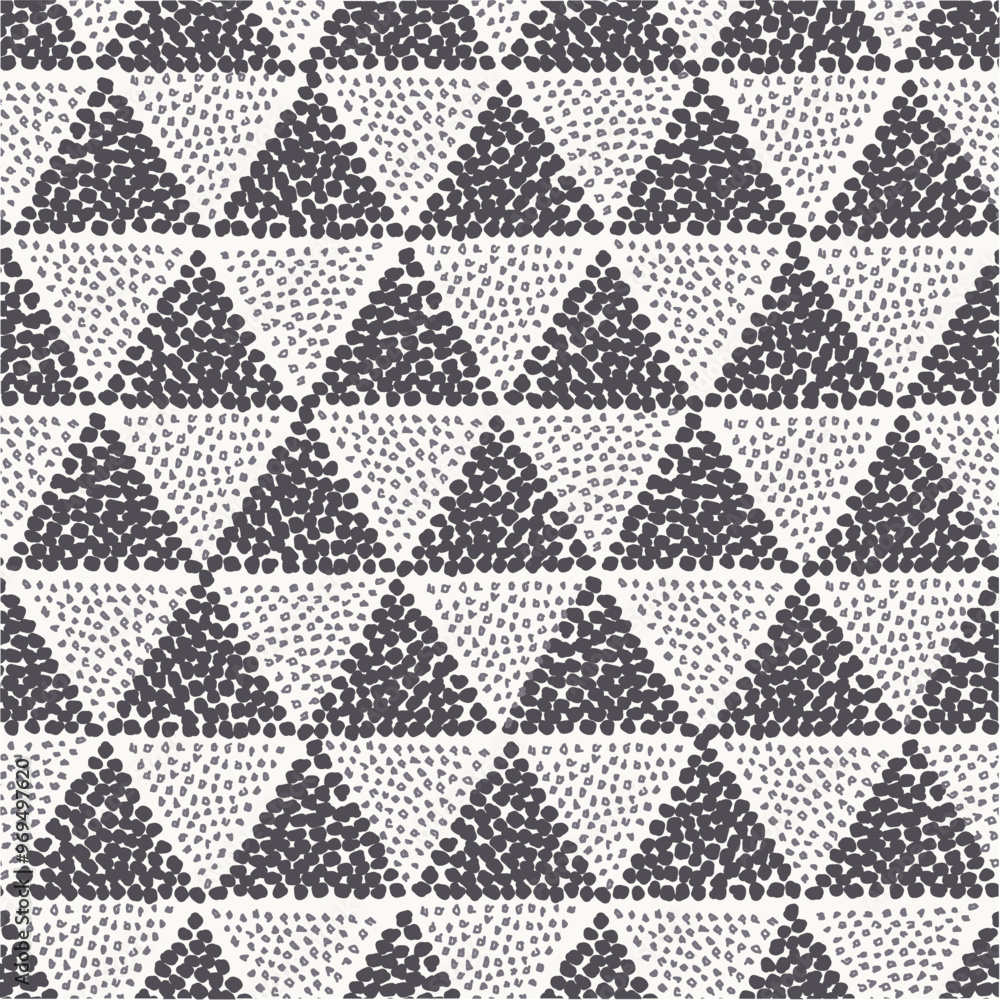 A repeating pattern of triangles filled with dotted textures in contrasting colors. A repeating pattern of triangles filled with dotted textures in contrasting colors.
