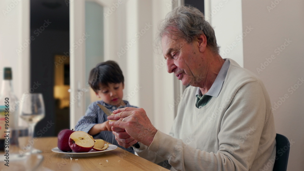 Grandfather and grandson at a dining table, sharing an apple. scene emphasizes family bonding and togetherness during a simple meal in a cozy home environment Grandfather and grandson at a dining table, sharing an apple. scene emphasizes family bonding and togetherness during a simple meal in a cozy home environment