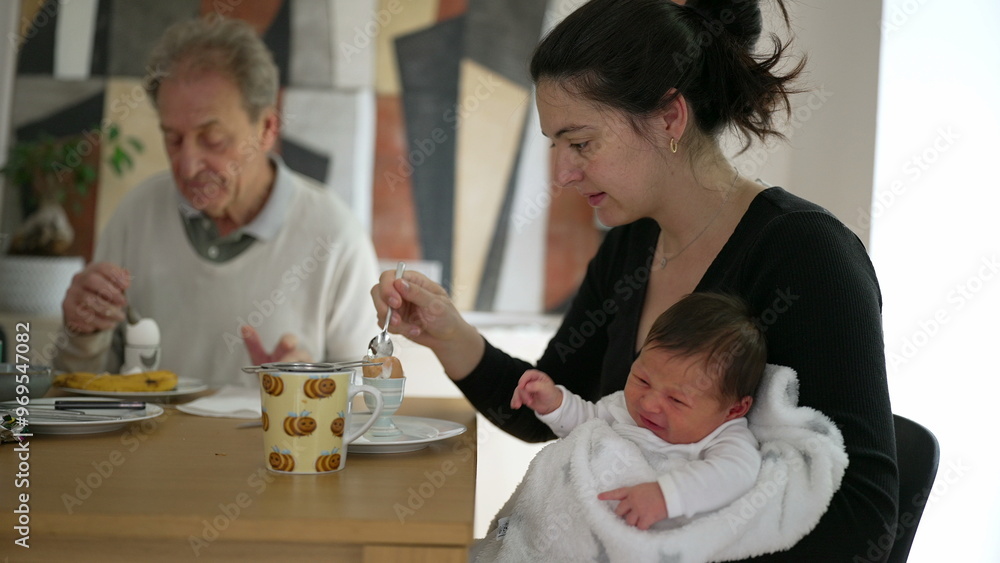Family breakfast scene with newborn and elderly man, multigenerational gathering, cozy home, grandparent enjoying meal, intimate family moment Family breakfast scene with newborn and elderly man, multigenerational gathering, cozy home, grandparent enjoying meal, intimate family moment