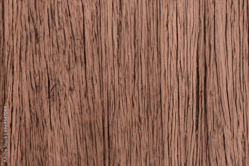 Close-up of brown wood grain texture with vertical lines and a rough surface. Close-up of brown wood grain texture with vertical lines and a rough surface.