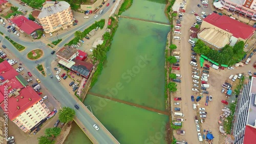 Aerial view a city with a river.