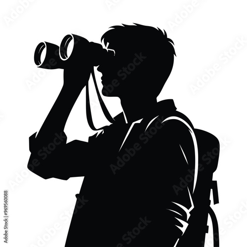 Silhouette of a person birdwatching
