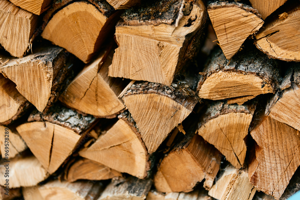closeup of wood pile with 'wood' and 'firewood' labels firewood supplies closeup of wood pile with 'wood' and 'firewood' labels firewood supplies