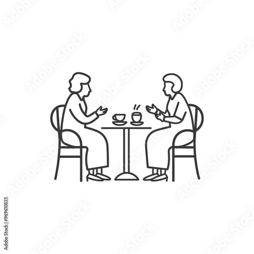 Two Women Sitting at a Table with Coffee Cups