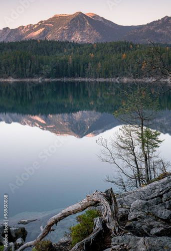 Mountain lake by sunset photo