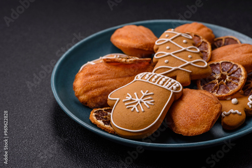 French classic madeleine sponge cake with elements of Christmas motifs photo