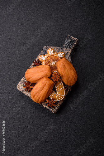 French classic madeleine sponge cake with elements of Christmas motifs photo