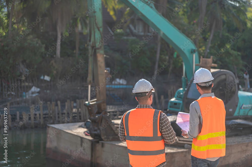 Construction engineer working on a bridge construction site over a river,Civil engineer supervising work,Foreman inspects work at a construction site,Discuss technical problems together Construction engineer working on a bridge construction site over a river,Civil engineer supervising work,Foreman inspects work at a construction site,Discuss technical problems together