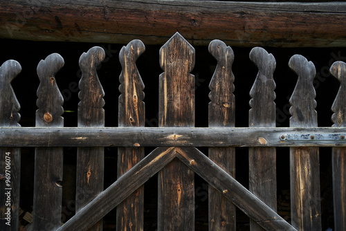 Old Carved Gate with Viking Patterns at Maihaugen in the Lillestrøm Open-Air Museum: A Glimpse into Norwegian Craftsmanship and Viking-Era Artistry photo