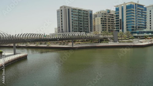 Walkway at the Al Raha, Abu Dhabi, UAE, on a hot sunny day photo