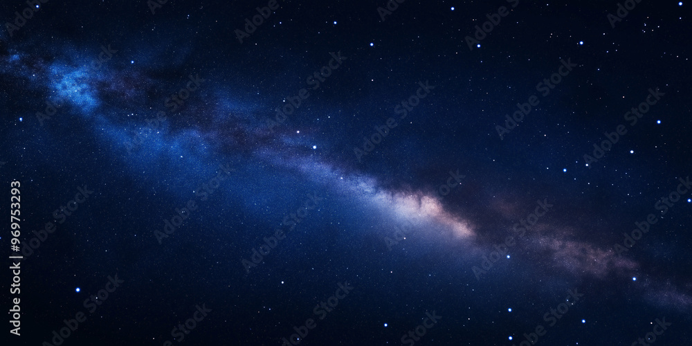 Fototapeta premium A view of the Milky Way galaxy stretching across the dark night sky, filled with stars and cosmic clouds, showcasing the vastness of space, selective focus