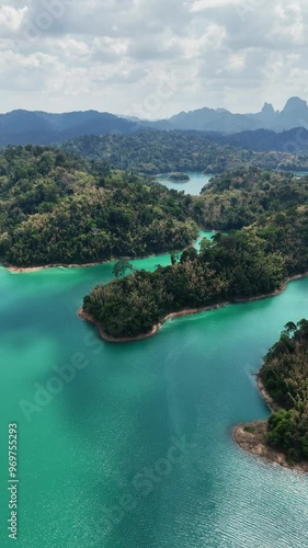 Khao Sok Lake Thailand Drone. Shot on DJI Mavic Air in the beautiful national park Khao Sok. The specific place is called Khao Sam Kloe. It is located in Ratchaprapha in the Cheow Lake in Thailand. photo