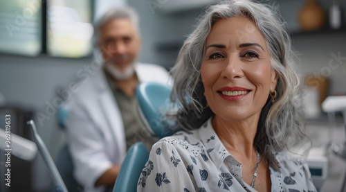 Close-up portrait of a senior woman with gray hair sitting on a dental chair