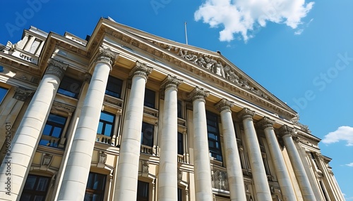 Majestic architectural marvel with towering columns and intricate details beneath a clear blue sky photo