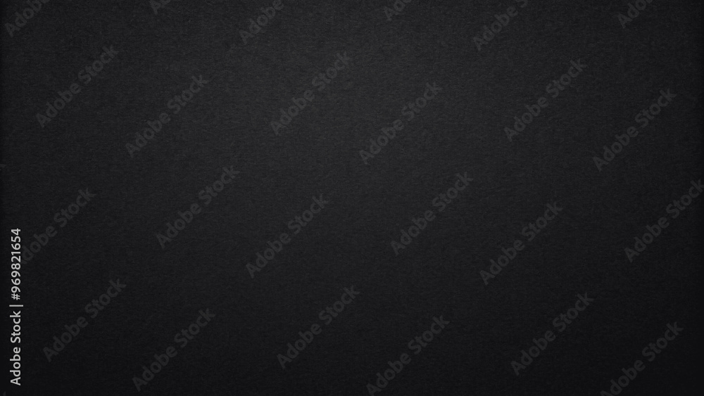Solid matte black color background with a smooth texture Solid matte black color background with a smooth texture