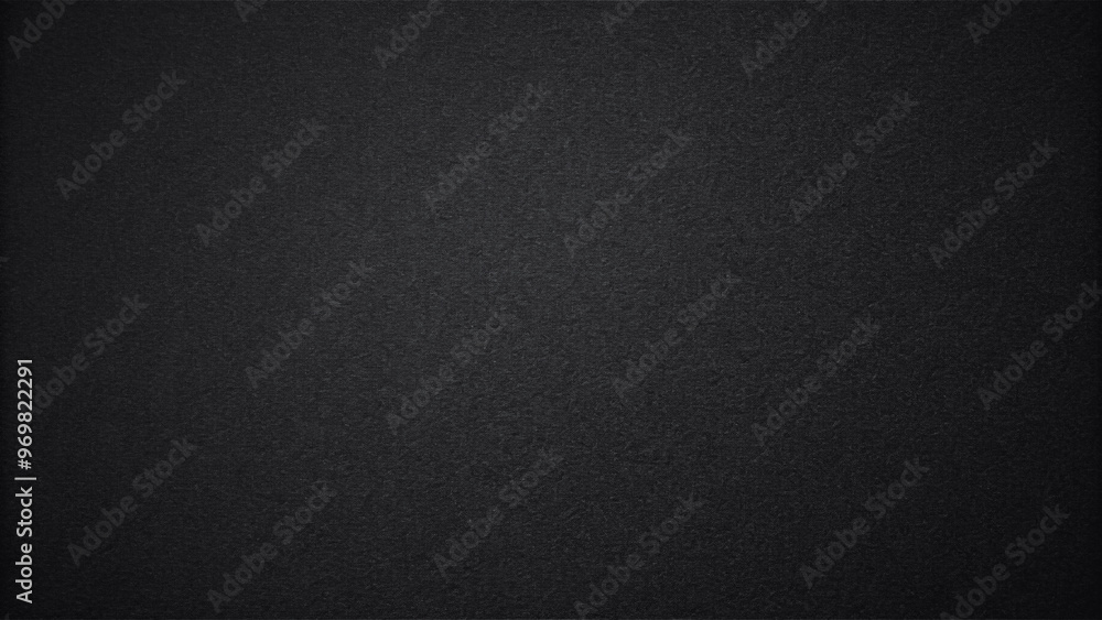 Solid matte black color background with a smooth texture