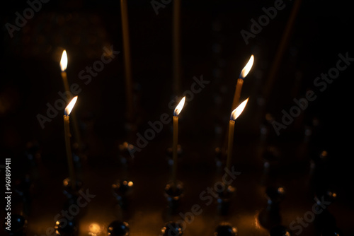 Wallpaper Mural Candles burn in dark. Religious rite. Wax candles. Torontodigital.ca